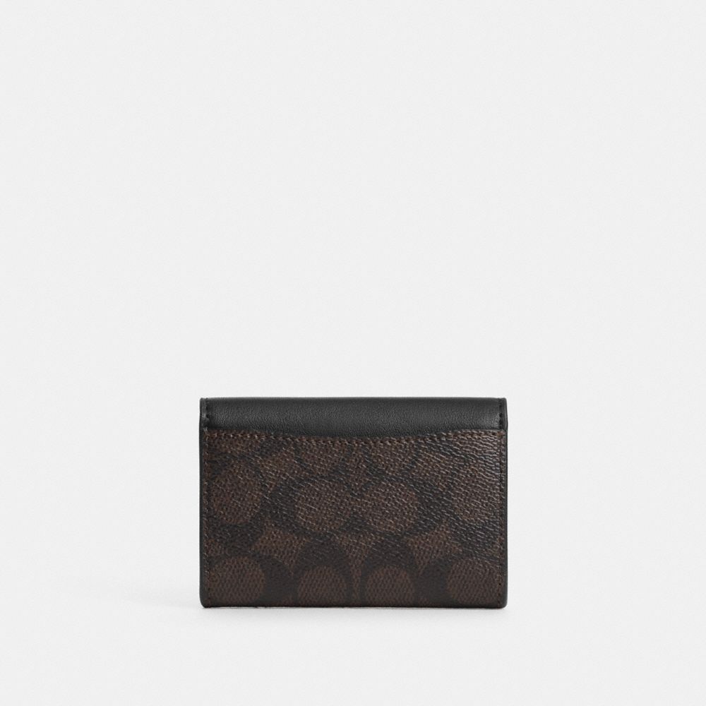 FLAP CARD CASE IN SIGNATURE CANVAS