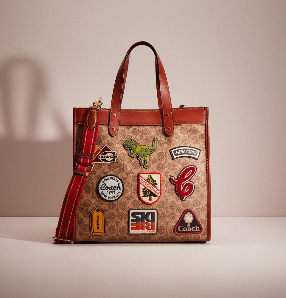 CG037 - Restored Field Tote In Signature Canvas With Patches Brass/Tan/Rust