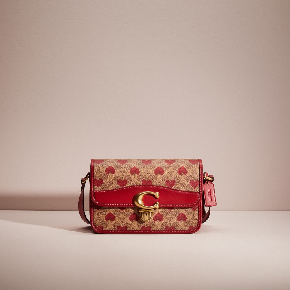 CG240 - Restored Studio Shoulder Bag In Signature Canvas With Heart Print Brass/Tan Red Apple