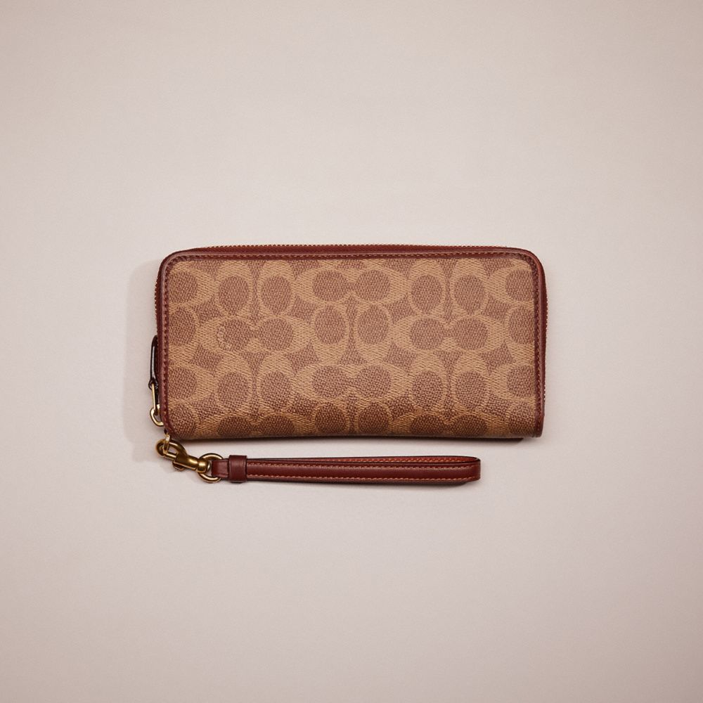 CG567 - Restored Continental Wallet In Signature Canvas Brass/Tan/Rust