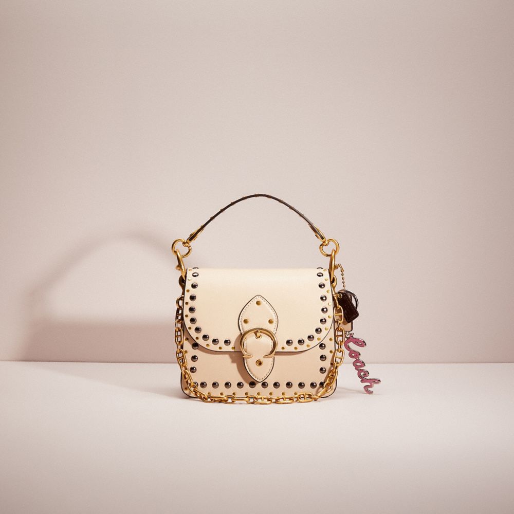 CG913 - Upcrafted Beat Shoulder Bag 18 With Rivets Brass/Ivory