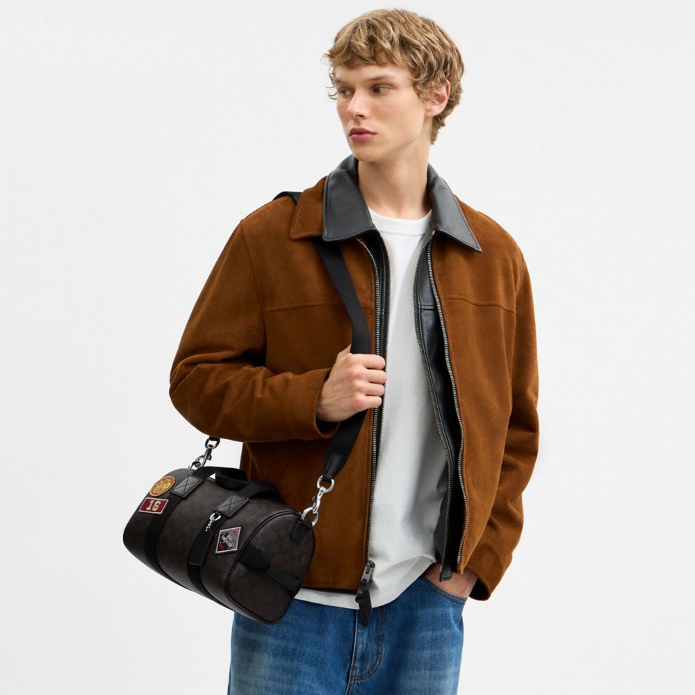 EXPLORER DUFFLE BAG 28 IN SIGNATURE CANVAS WITH PATCHES