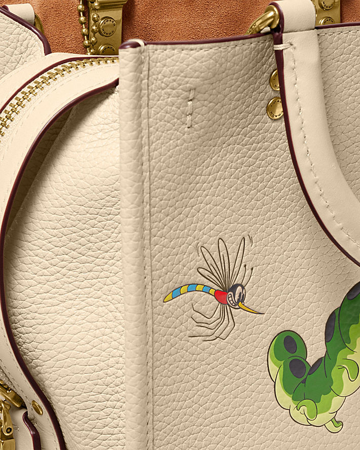 DISNEY X COACH ROGUE 25 IN REGENERATIVE LEATHER WITH MICKEY MOUSE AND CATERPILLAR