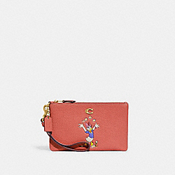 Disney X Coach Small Wristlet In Regenerative Leather With Daisy Duck - CH470 - Brass/Burnt Coral