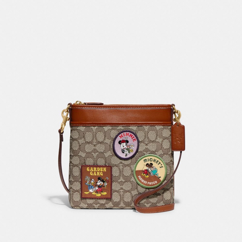 COACH CH491 Disney X Coach Kitt Messenger Crossbody In Signature Textile Jacquard With Patches Brass/Cocoa Burnished Amb