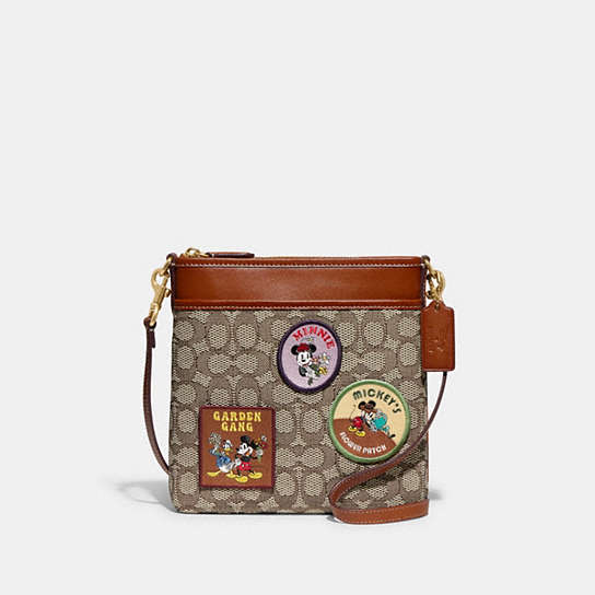 CH491 - Disney X Coach Kitt Messenger Crossbody In Signature Textile Jacquard With Patches Brass/Cocoa Burnished Amb