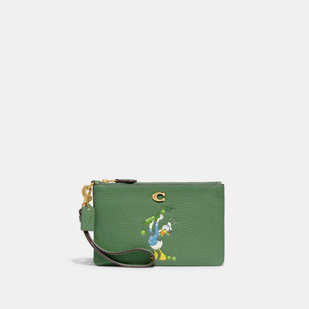 COACH CH499 Disney X Coach Small Wristlet In Regenerative Leather With Donald Duck Brass/Soft Green