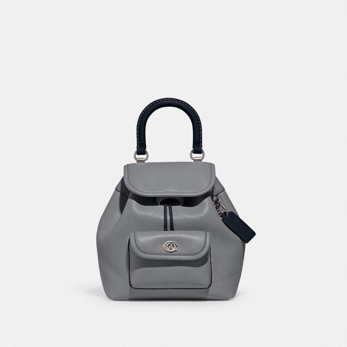 Coach mini turnlock discount backpack