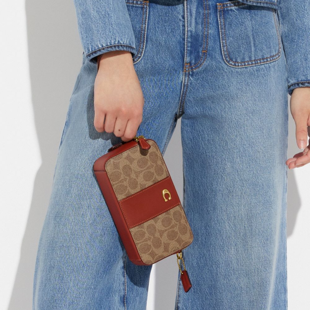 KIRA CROSSBODY BAG IN COLORBLOCK SIGNATURE CANVAS