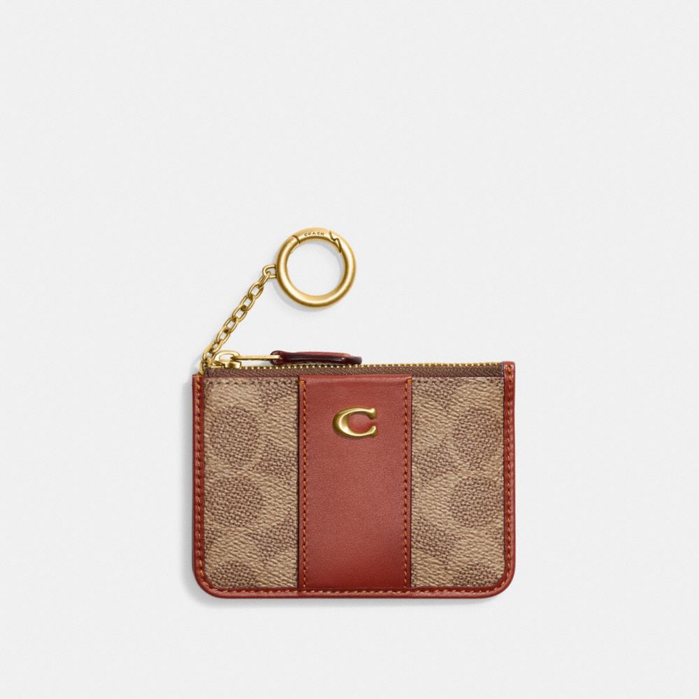 CI185 - Mini Skinny Id Case In Signature Canvas Brass/Tan/Rust