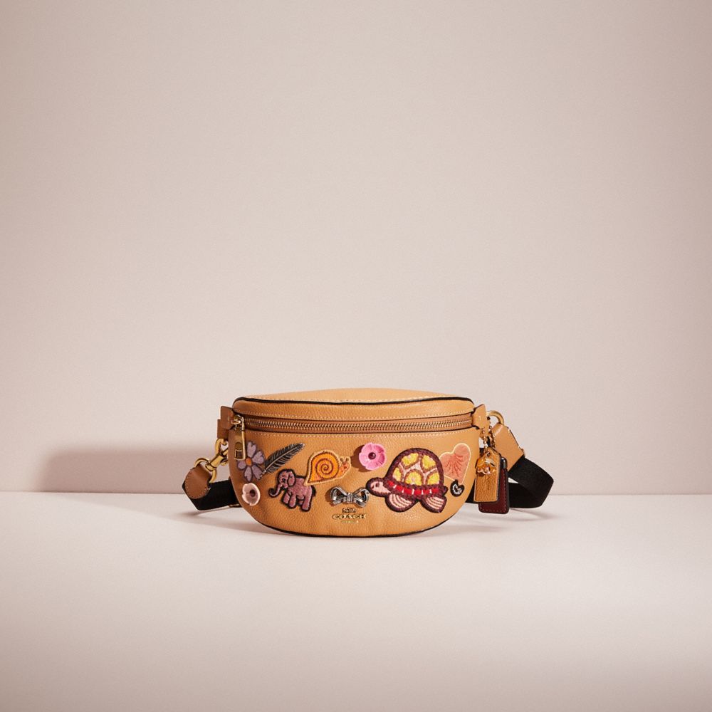 CI640 - Upcrafted Bethany Belt Bag With Creature Patches Brass/Light Tan Multi