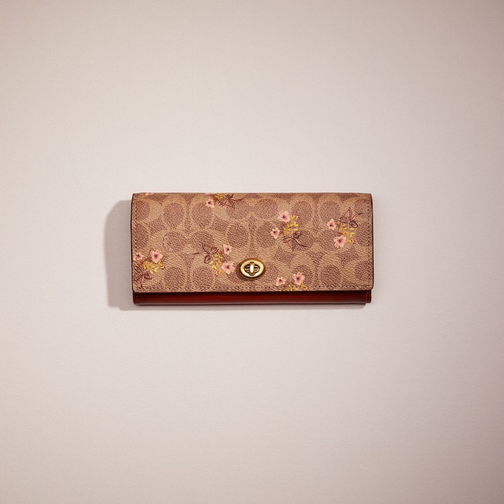 CJ548 - Restored Envelope Wallet In Signature Canvas With Floral Bow Print Brass/Tan
