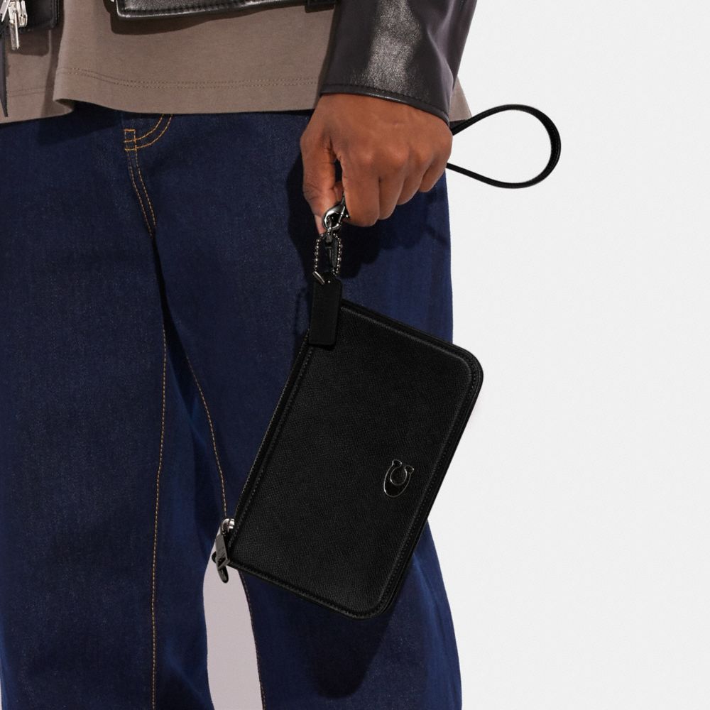 POUCH BAG WITH SIGNATURE CANVAS INTERIOR