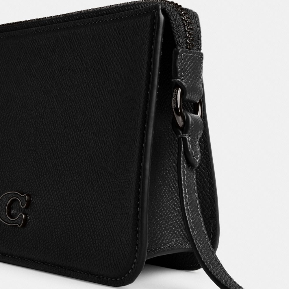 POUCH BAG WITH SIGNATURE CANVAS INTERIOR