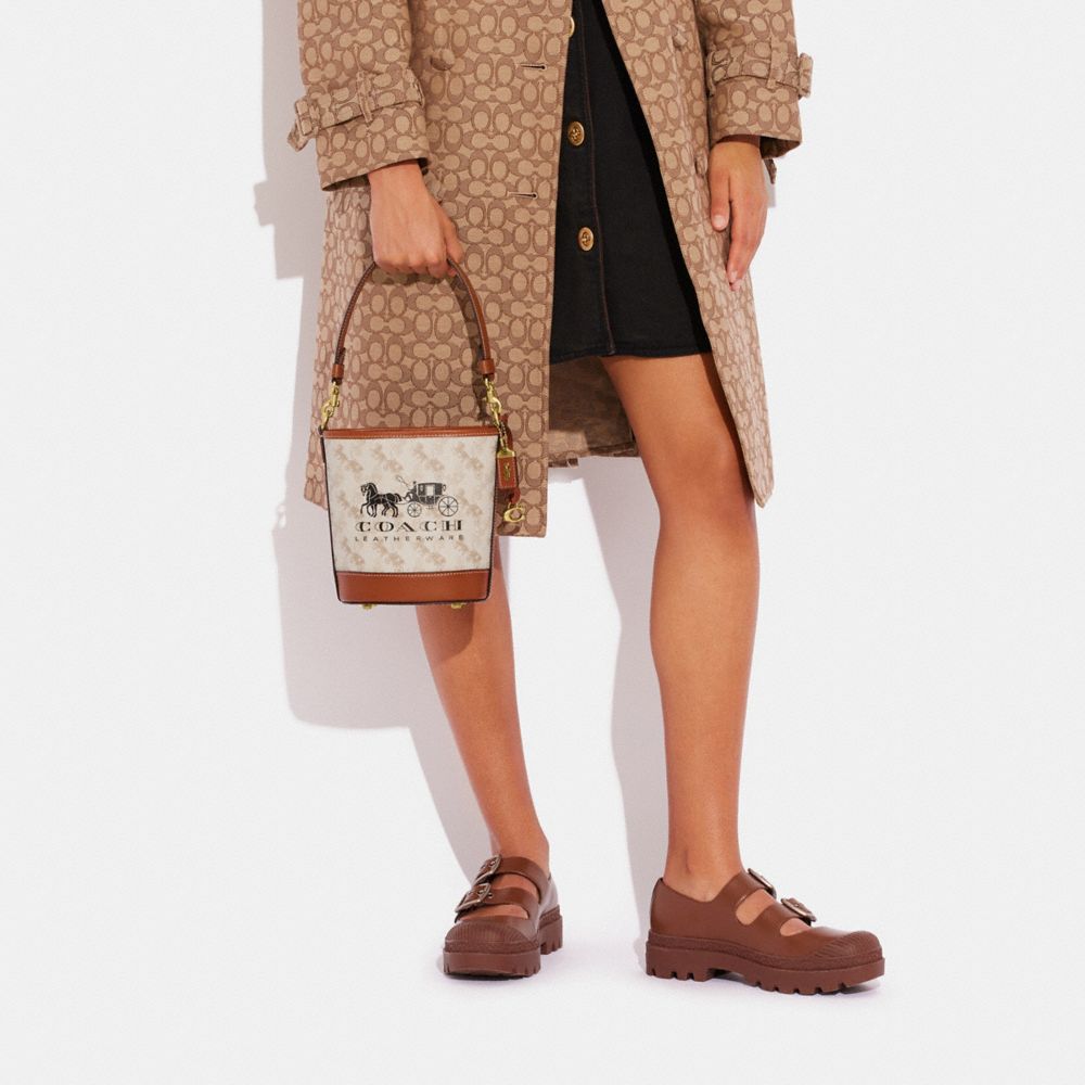 DAKOTA 16 馬車主題圖案水桶包