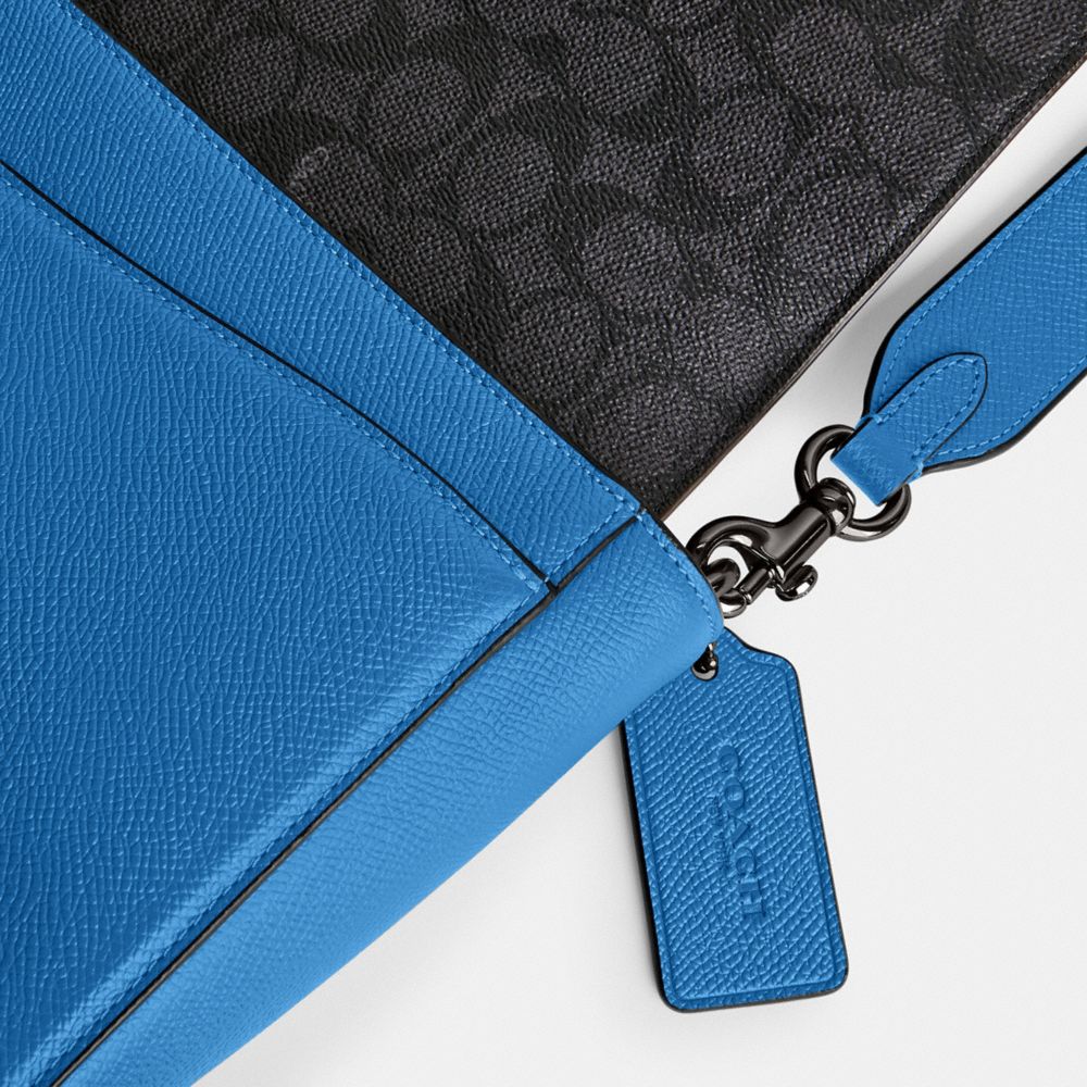 MESSENGER BAG WITH SIGNATURE CANVAS INTERIOR