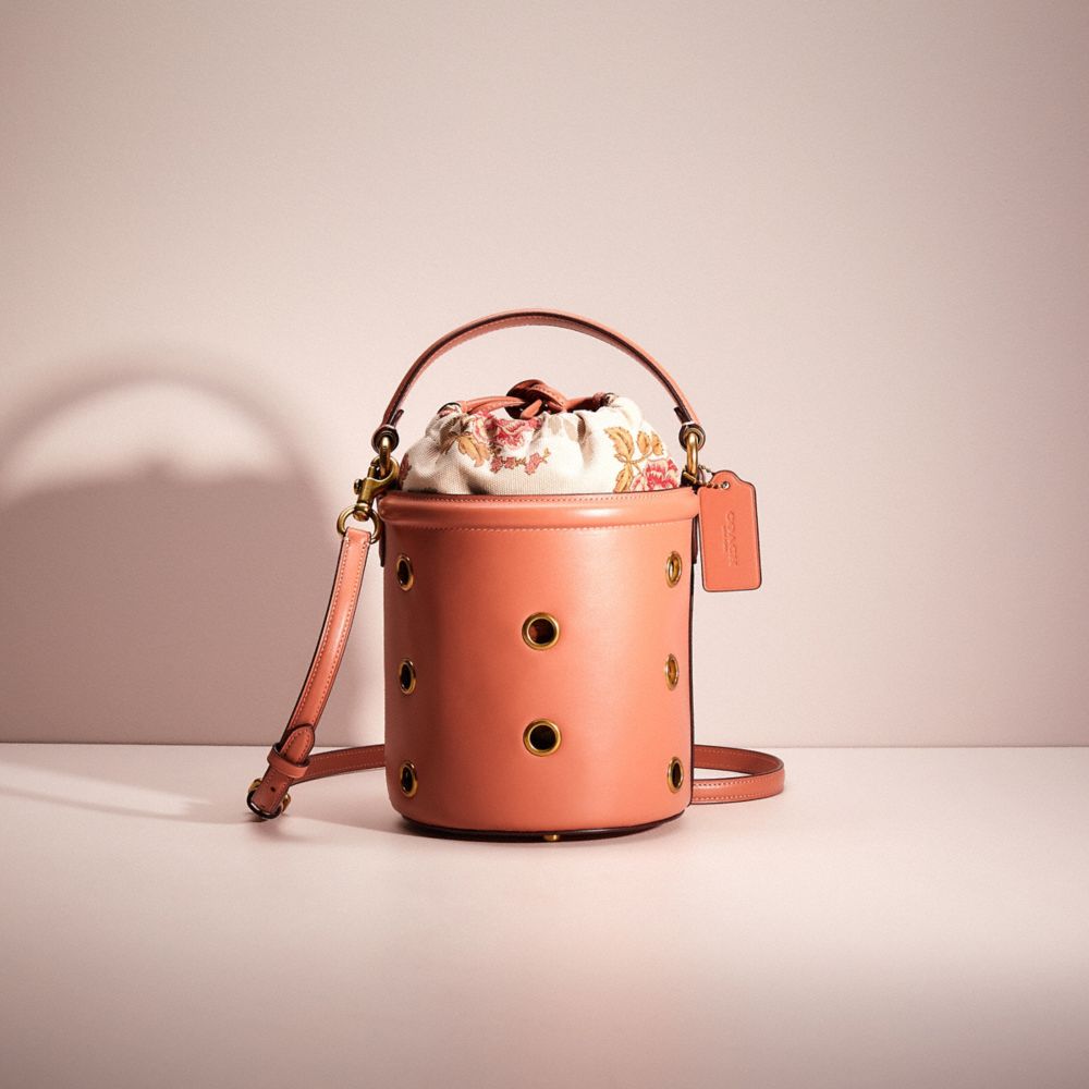 CK267 - Restored Drawstring Bucket Bag With Grommets Brass/Light Peach