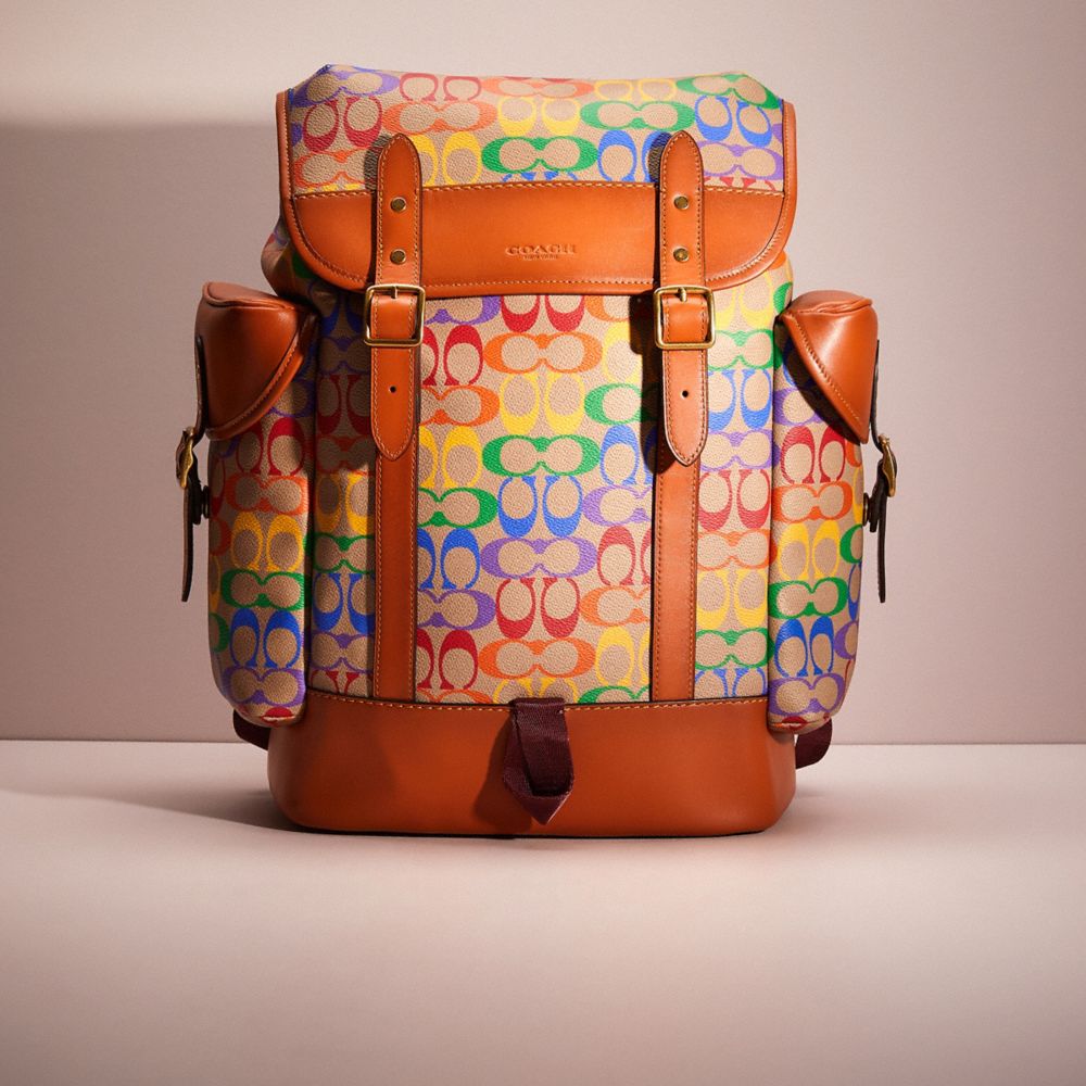 CK287 - Restored Hitch Backpack In Rainbow Signature Canvas Saddle Multi