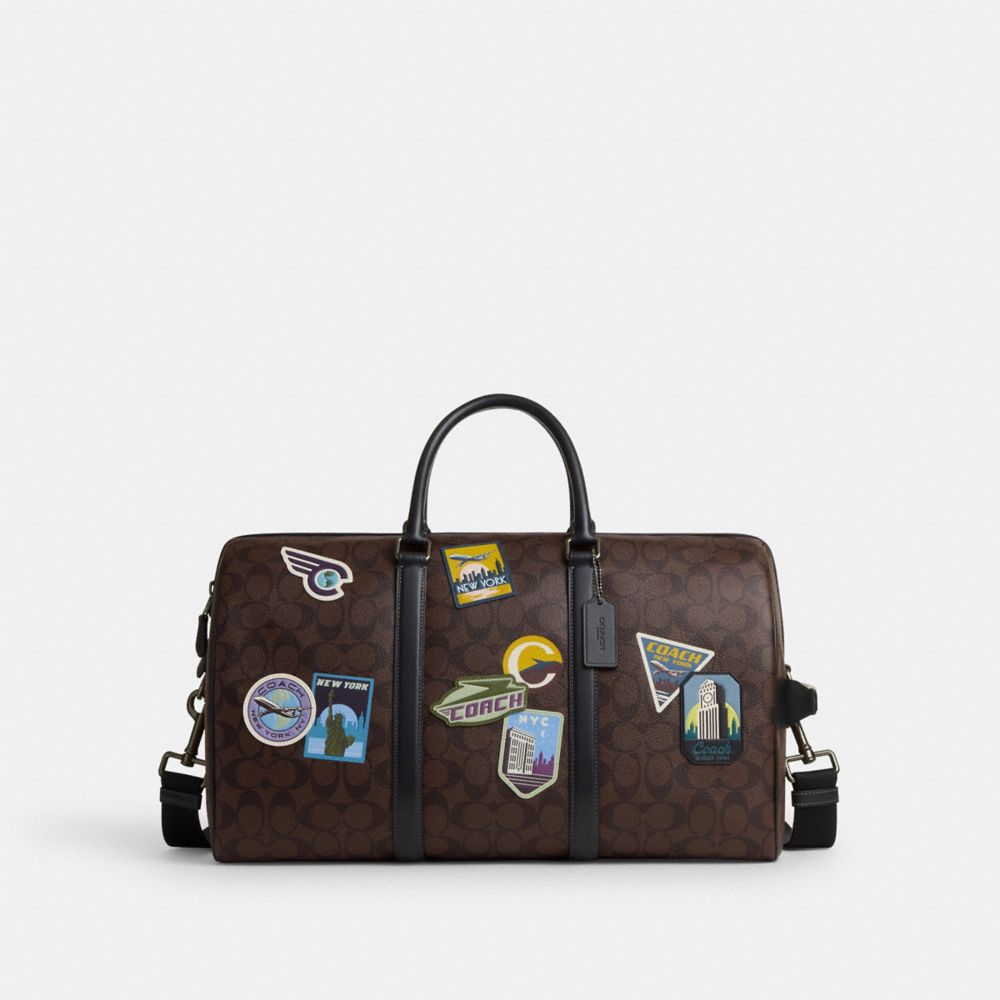 COACH CL434 Venturer Bag In Signature Canvas With Travel Patches Gunmetal/Mahogany Multi