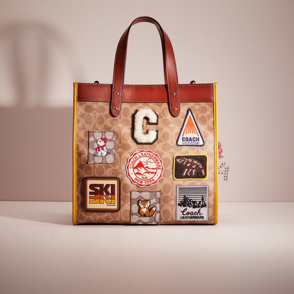 CL704 - Upcrafted Field Tote In Signature Canvas With Horse And Carriage Print Brass/Tan Truffle Rust