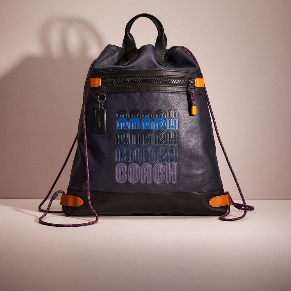 CL985 - Restored Academy Drawstring Backpack In Colorblock Midnight Navy/Black Copper