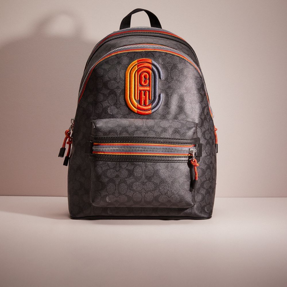 CM002 - Restored Academy Backpack In Signature Canvas With Varsity Zipper Silver/Charcoal Multi