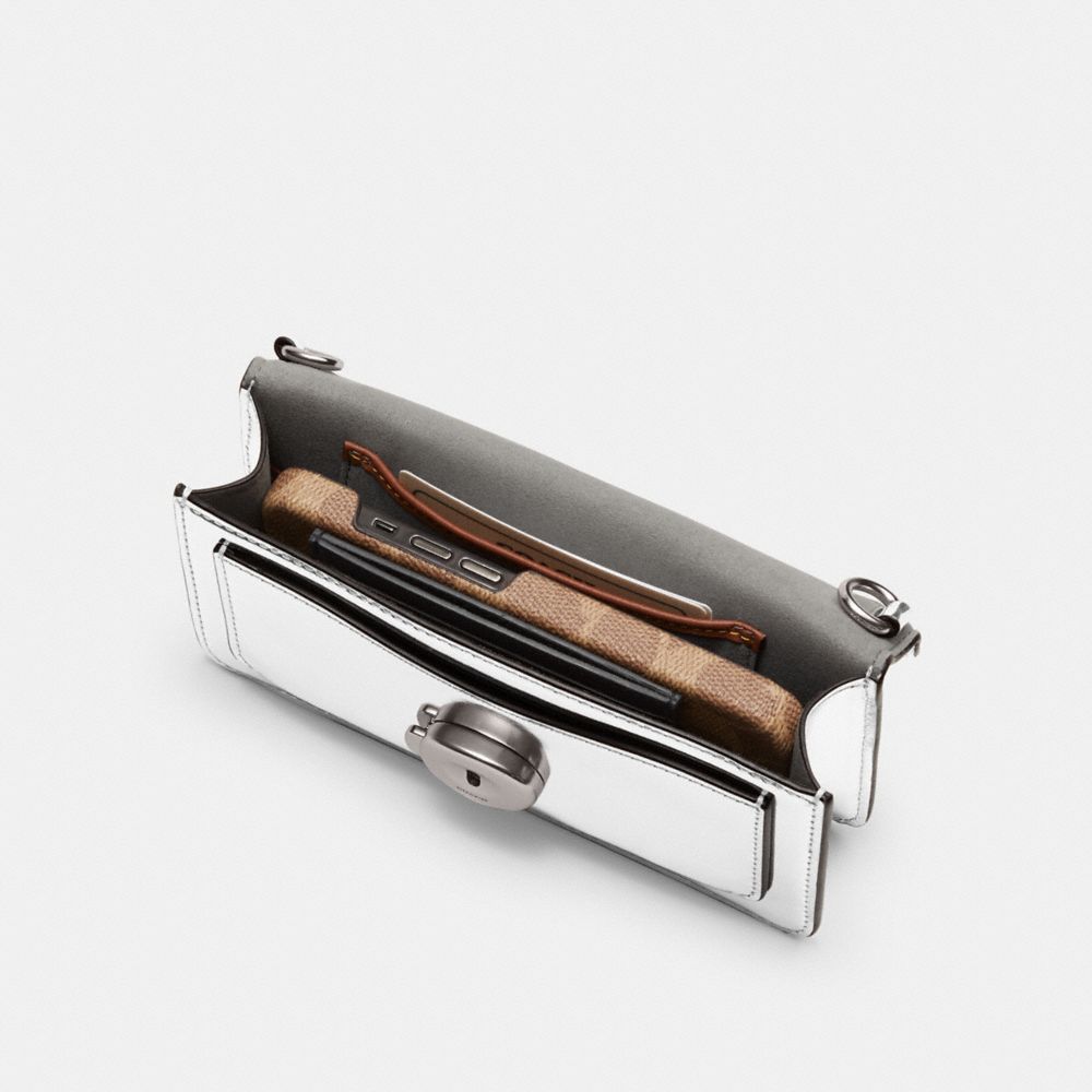 TABBY 斜背手腕包