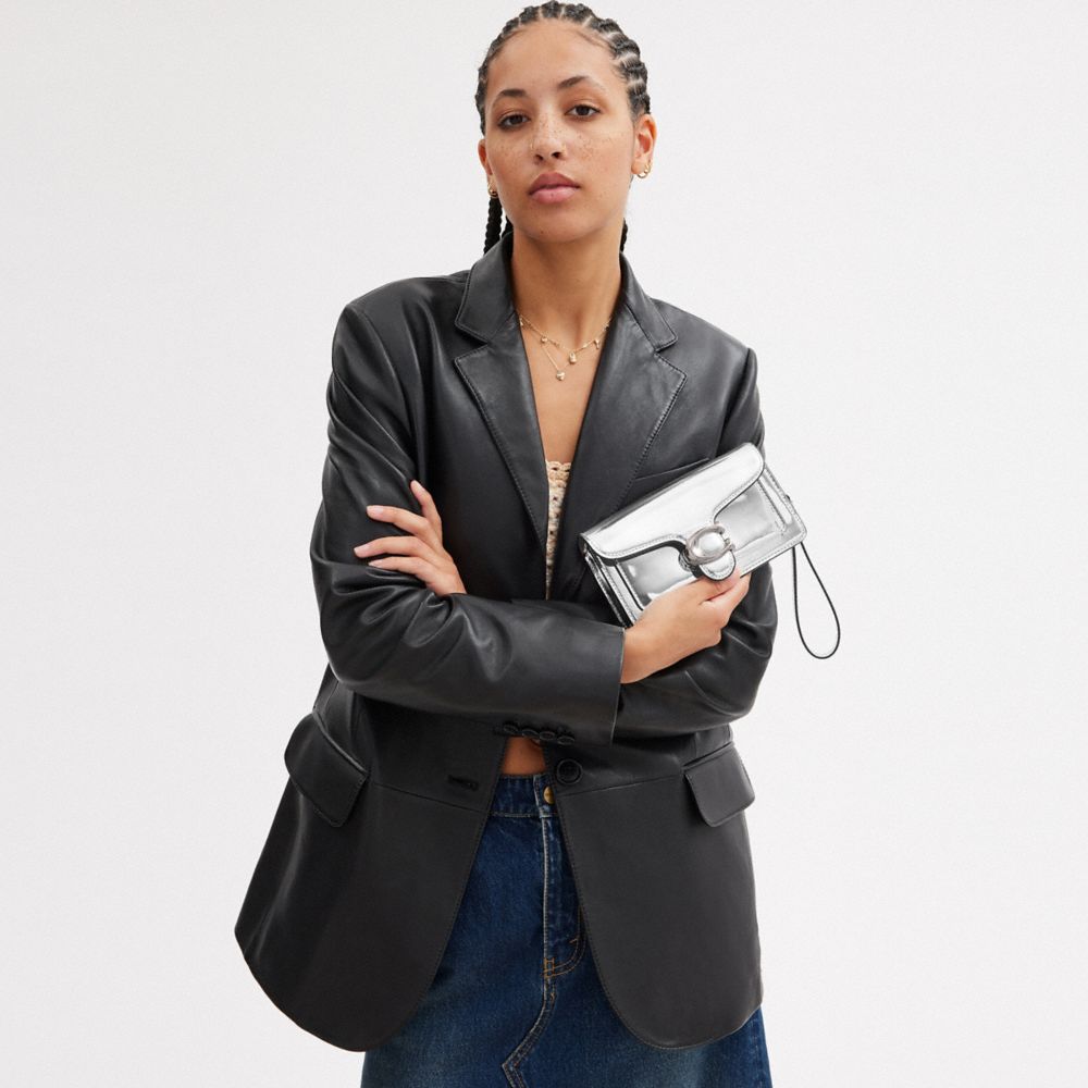 TABBY 斜背手腕包