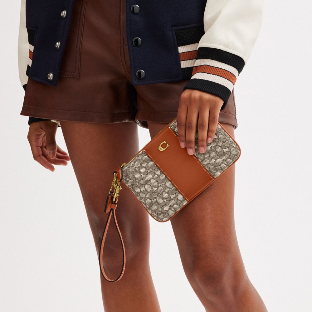 迷你經典 SIGNATURE 緹花面料小型手腕包