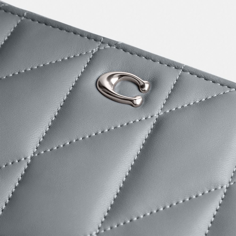 KIRA 絎縫斜背手袋