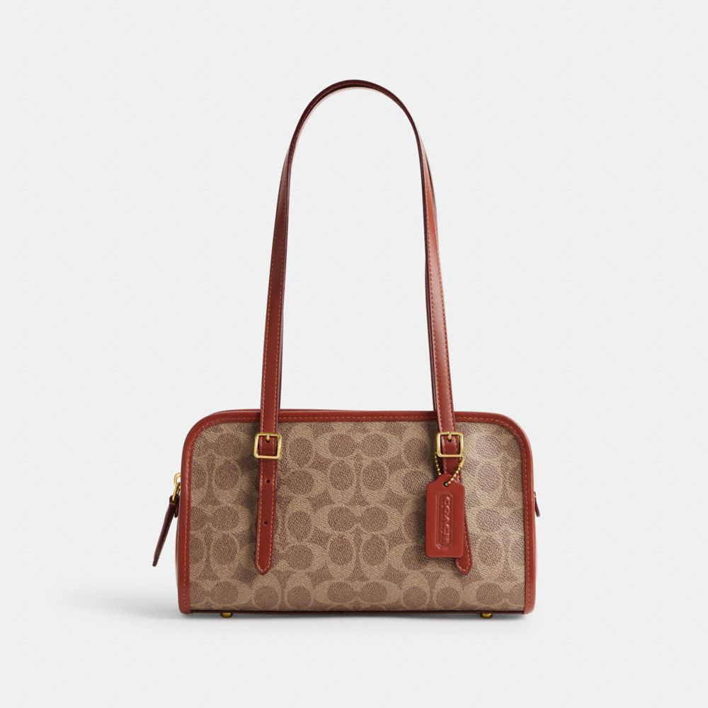 COACH Official Site Official page | SWING ZIP IN SIGNATURE CANVAS