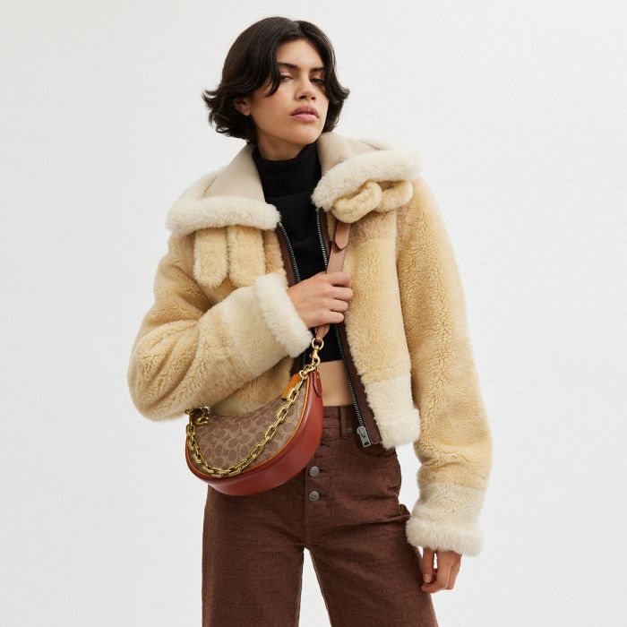 MIRA SHOULDER BAG IN SIGNATURE CANVAS