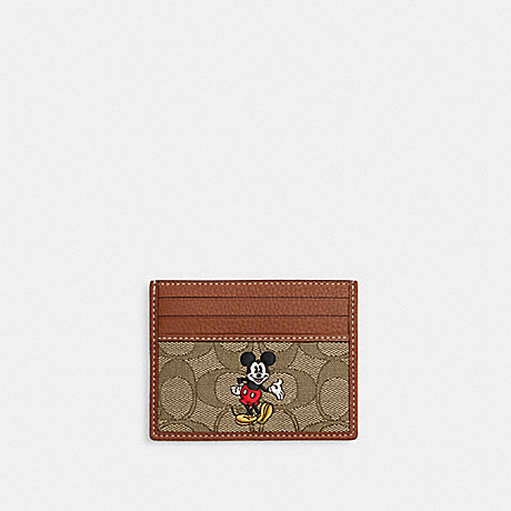 COACH CM719 Disney X Coach Slim Id Card Case In Signature Jacquard With Mickey Mouse Print Brass/Khaki Multi