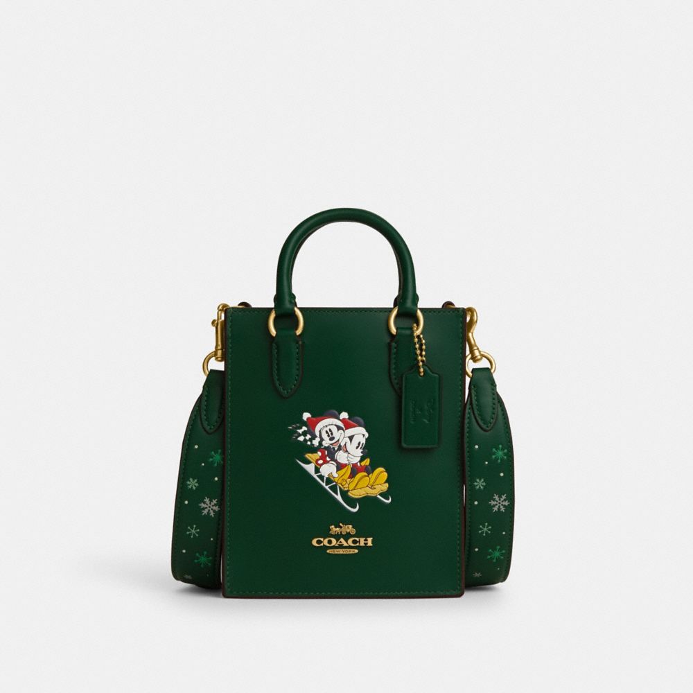 COACH CN021 Disney X Coach North South Mini Tote With Sled Motif Brass/Dark Pine