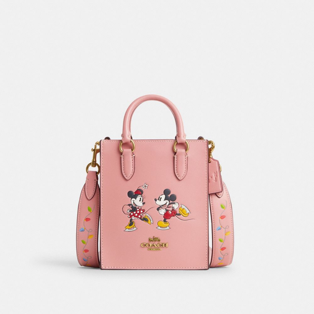 COACH CN023 Disney X Coach North South Mini Tote With Ice Skate Motif Brass/Light Blush Multi