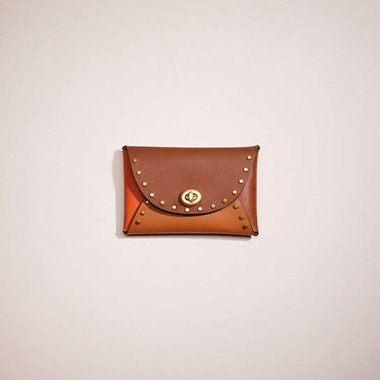 CN210 - Remade Medium Pouch With Rivets Brown