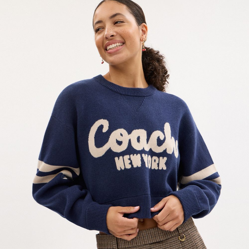 CROPPED COACH SWEATER