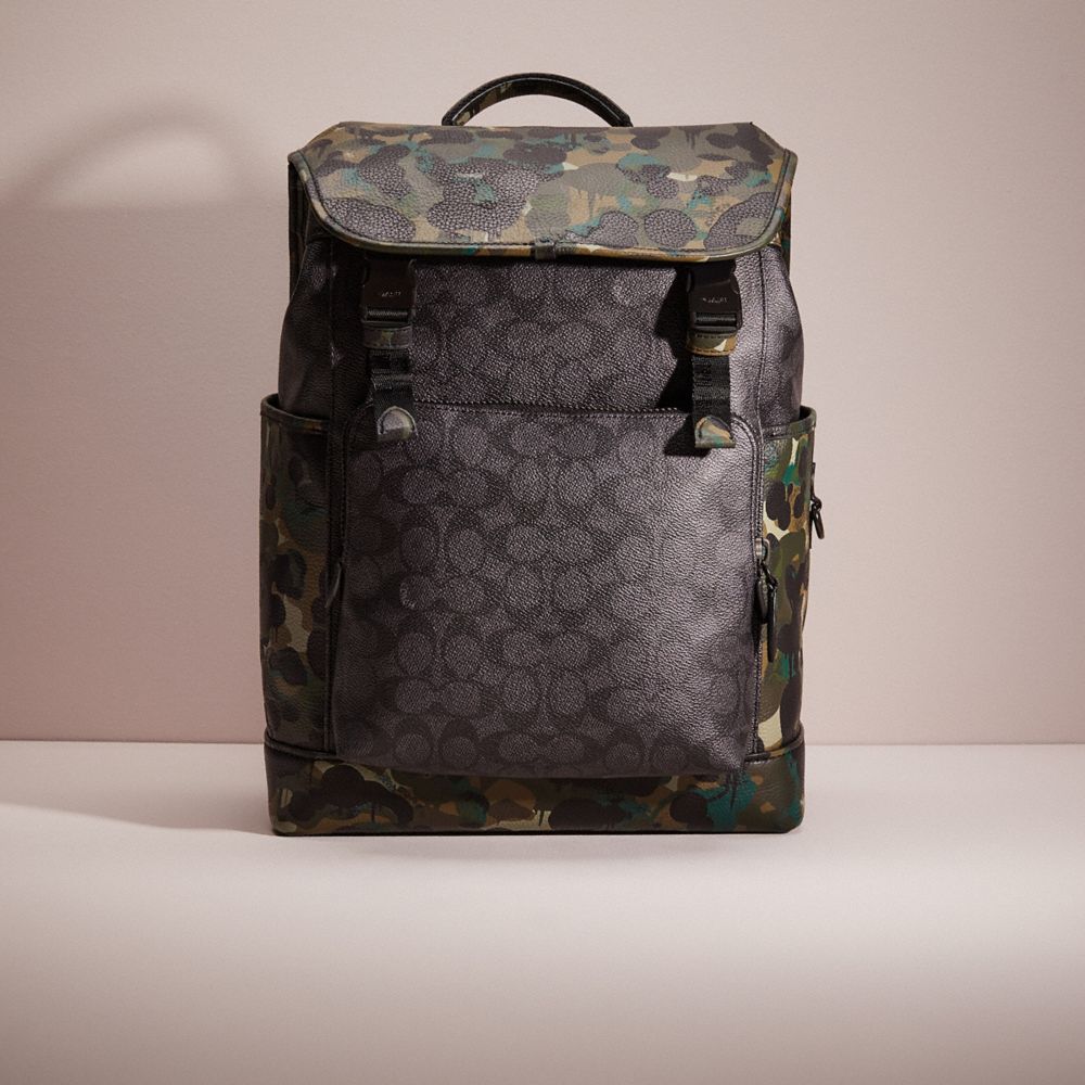 CO166 - Restored League Flap Backpack In Signature Canvas With Camo Print Charcoal Multi