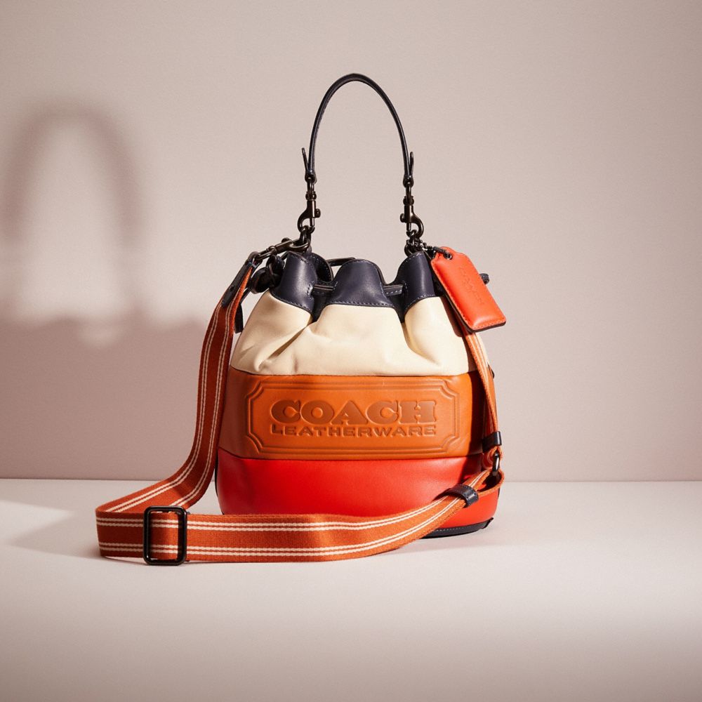 CO182 - Restored Field Bucket Bag With Colorblock Quilting And Coach Badge Pewter/Multi