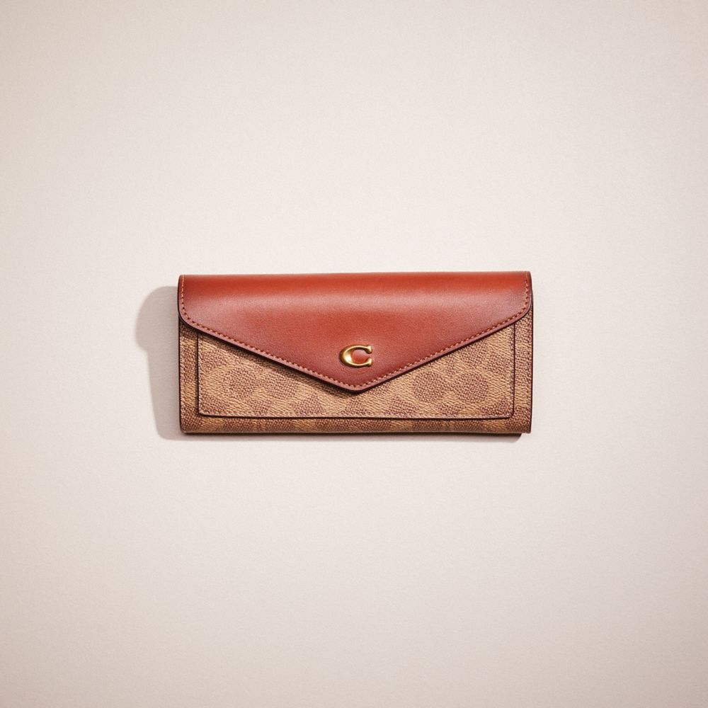 CO901 - Restored Wyn Soft Wallet In Colorblock Signature Canvas Brass/Tan/Rust
