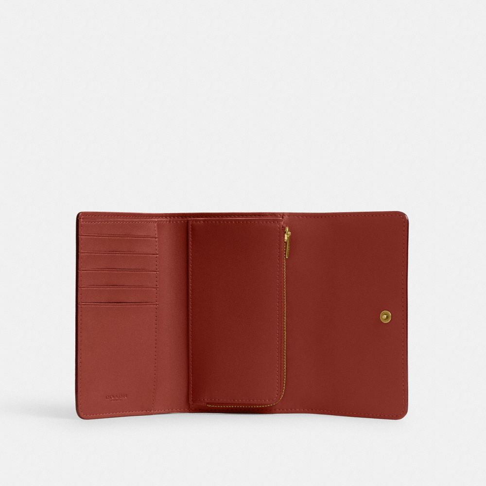 ESSENTIAL MEDIUM FLAP WALLET IN SIGNATURE CANVAS