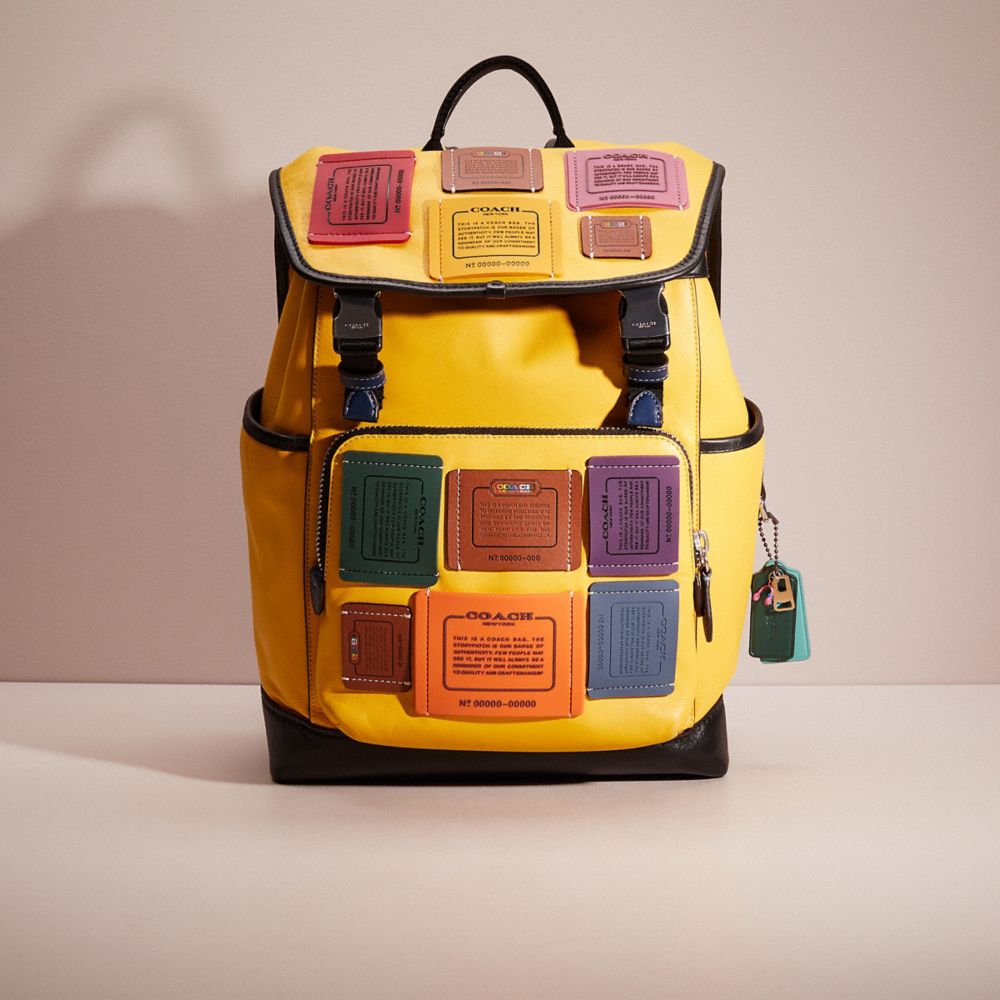 CQ417 - Upcrafted League Flap Backpack In Colorblock Light Anitique Nickel/Canary Multi