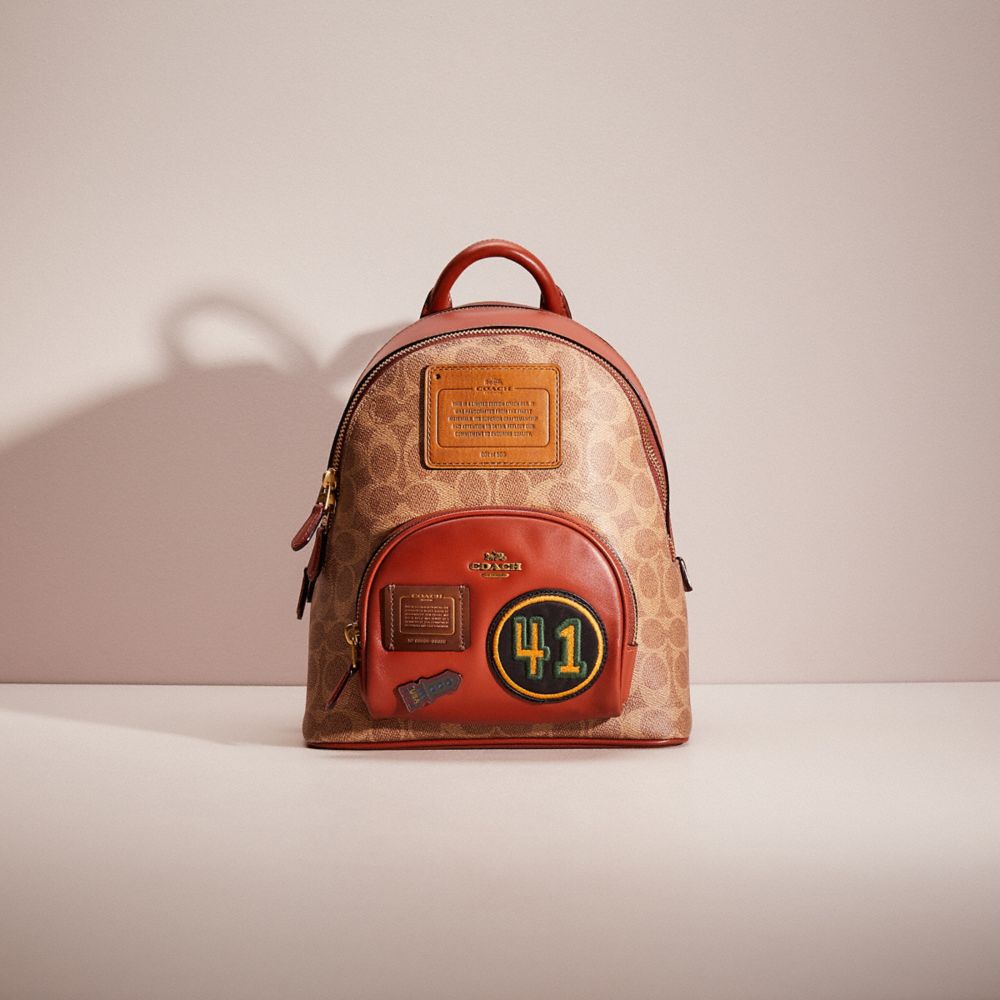 CQ433 - Upcrafted Carrie Backpack 23 In Signature Canvas Brass/Tan/Rust