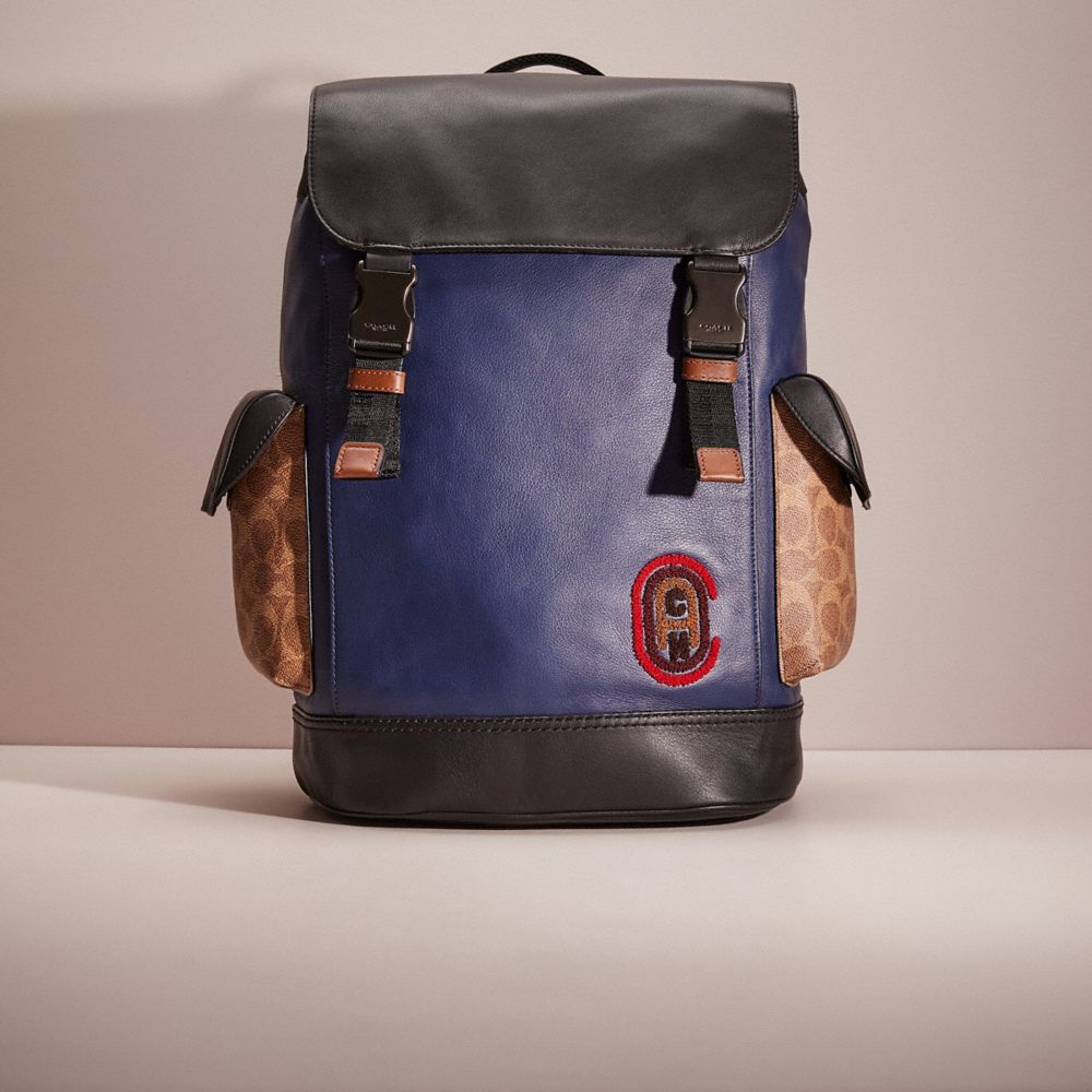 COACH CQ510 Restored Rivington Backpack With Signature Canvas Detail And Coach Patch Black Copper/Khaki/True Navy