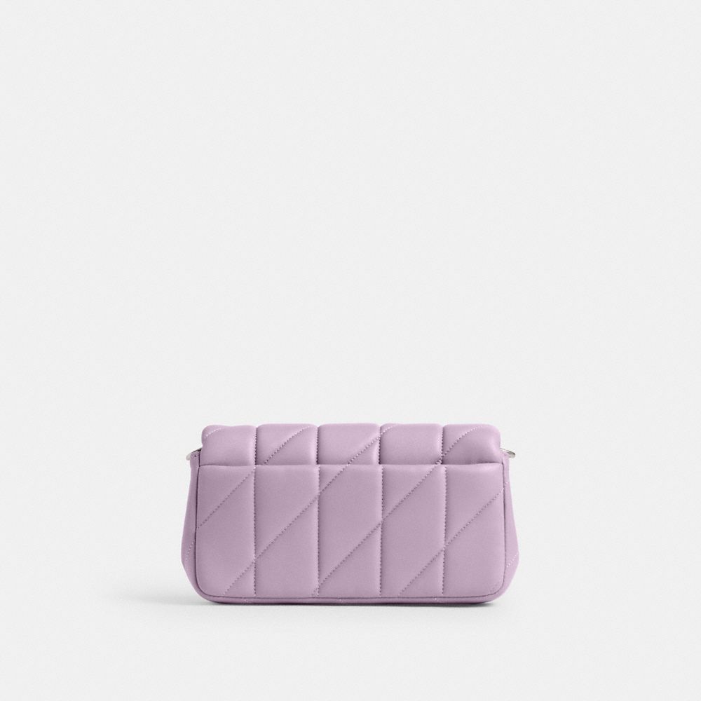 TABBY 菱形豐盈絎縫斜背手腕包