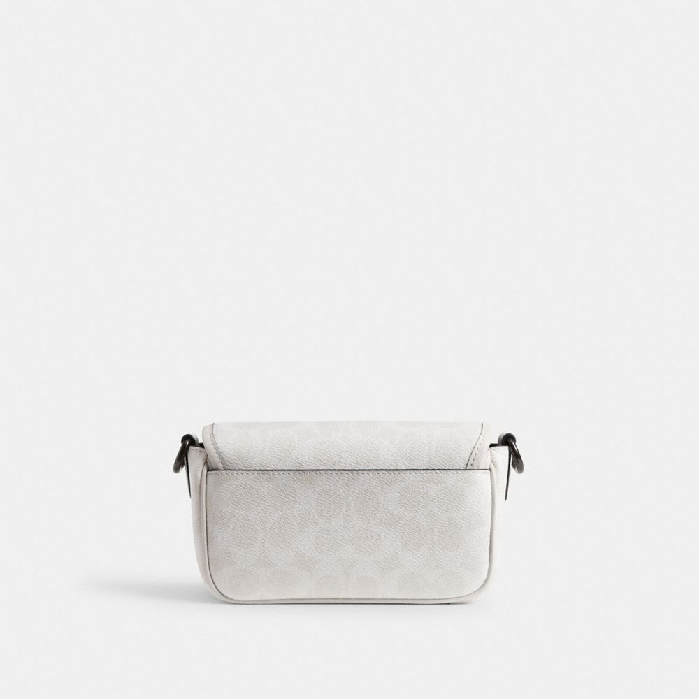 CHARTER FLAP CROSSBODY 18 IN SIGNATURE CANVAS