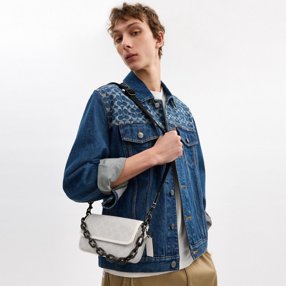 CHARTER FLAP CROSSBODY 18 IN SIGNATURE CANVAS