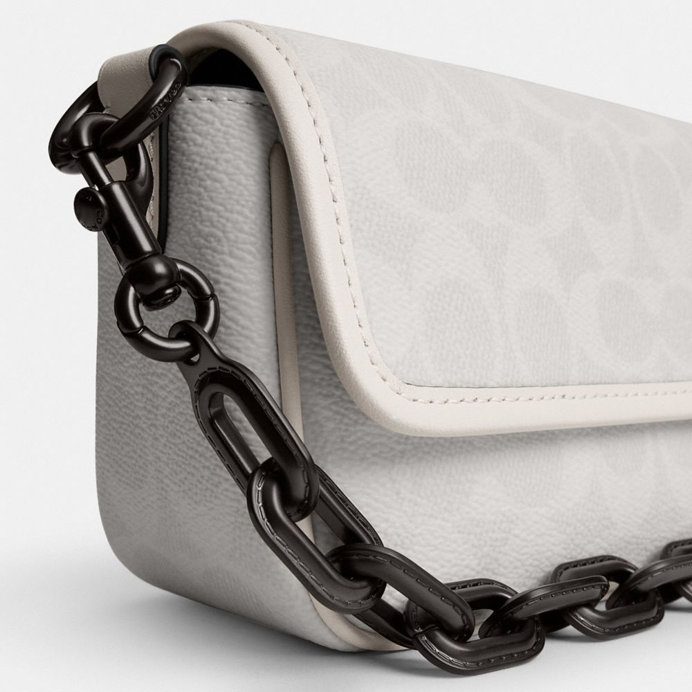 CHARTER FLAP CROSSBODY 18 IN SIGNATURE CANVAS