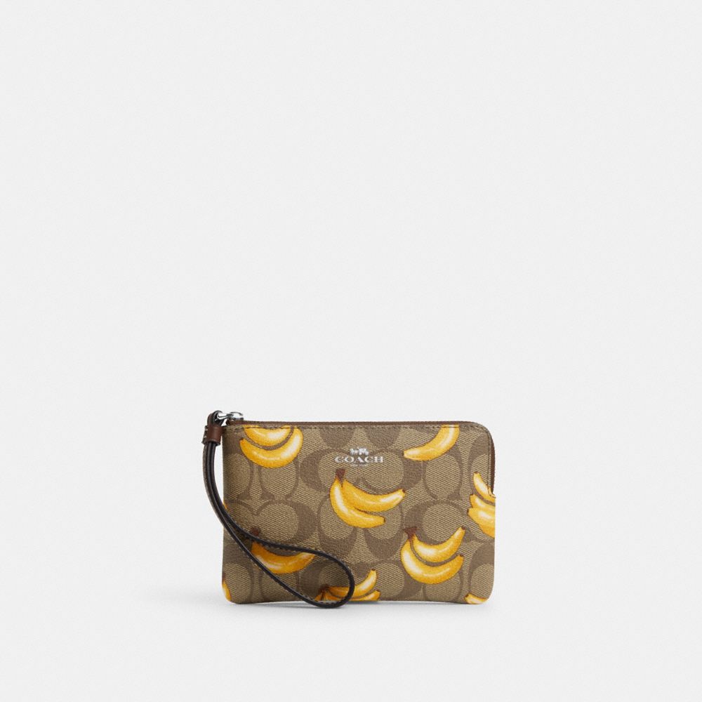 Corner Zip Wristlet In Signature Canvas With Banana Print - CR820 - Silver/Khaki/Dark Saddle