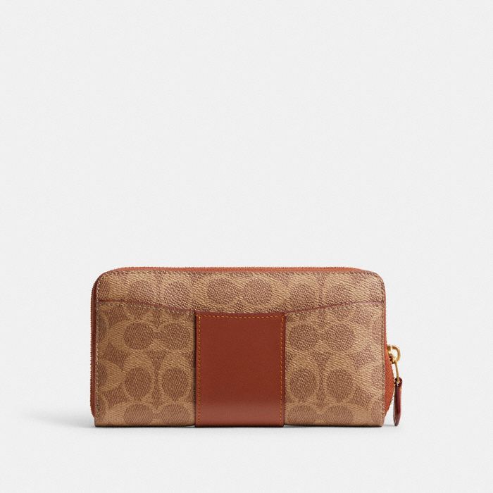 ACCORDION ZIP WALLET IN COLORBLOCK SIGNATURE CANVAS